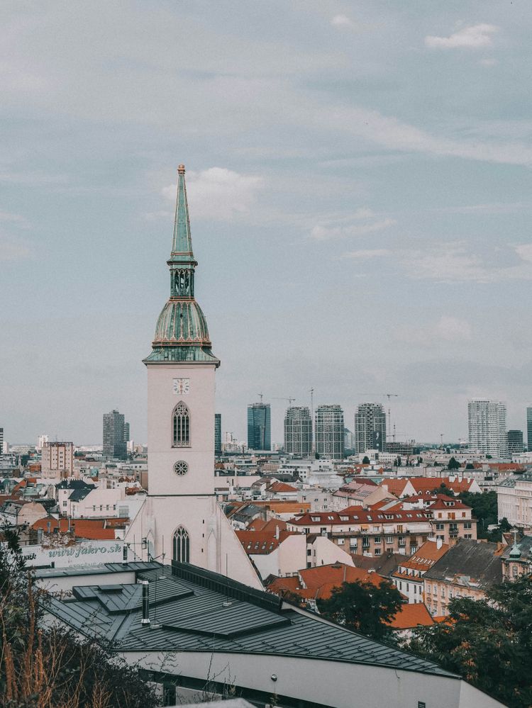 a view of a city with a clock tower