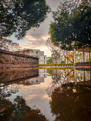 a reflection of a building in the water