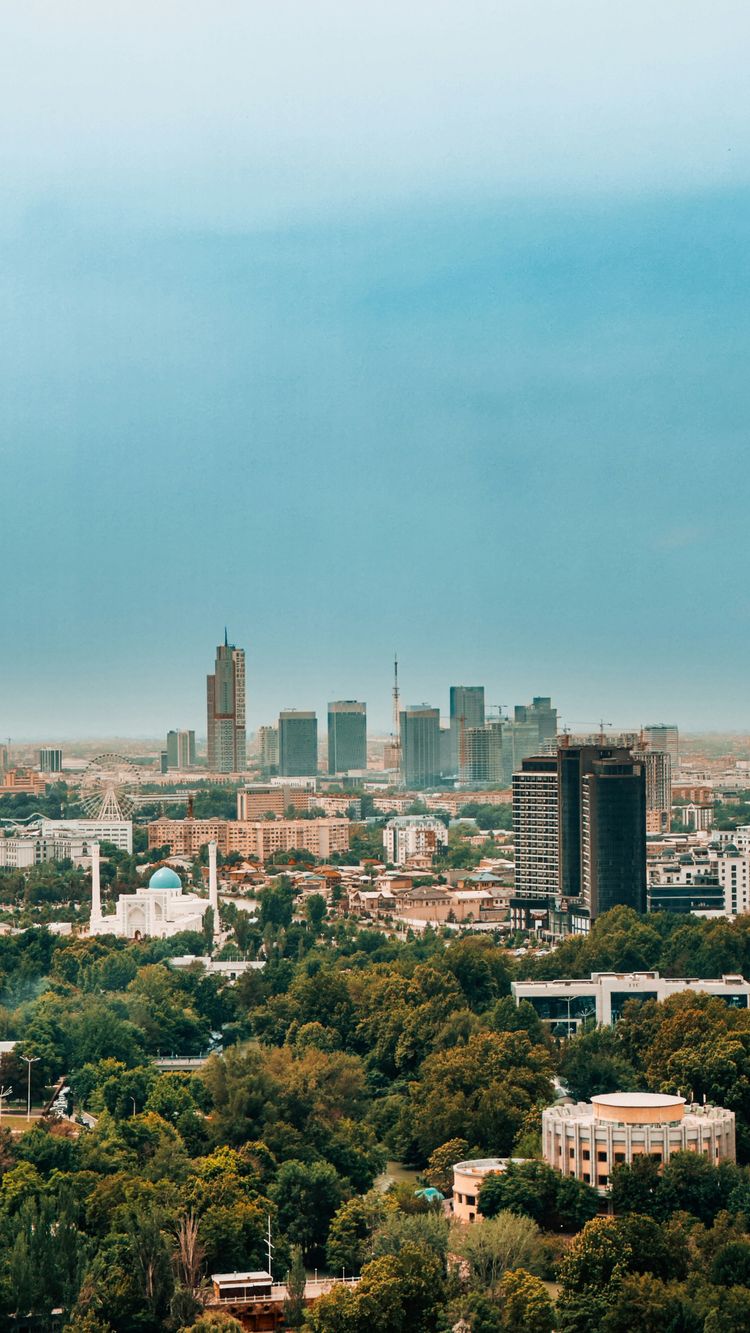 a view of a city with tall buildings