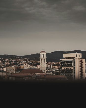 a view of a city with a clock tower