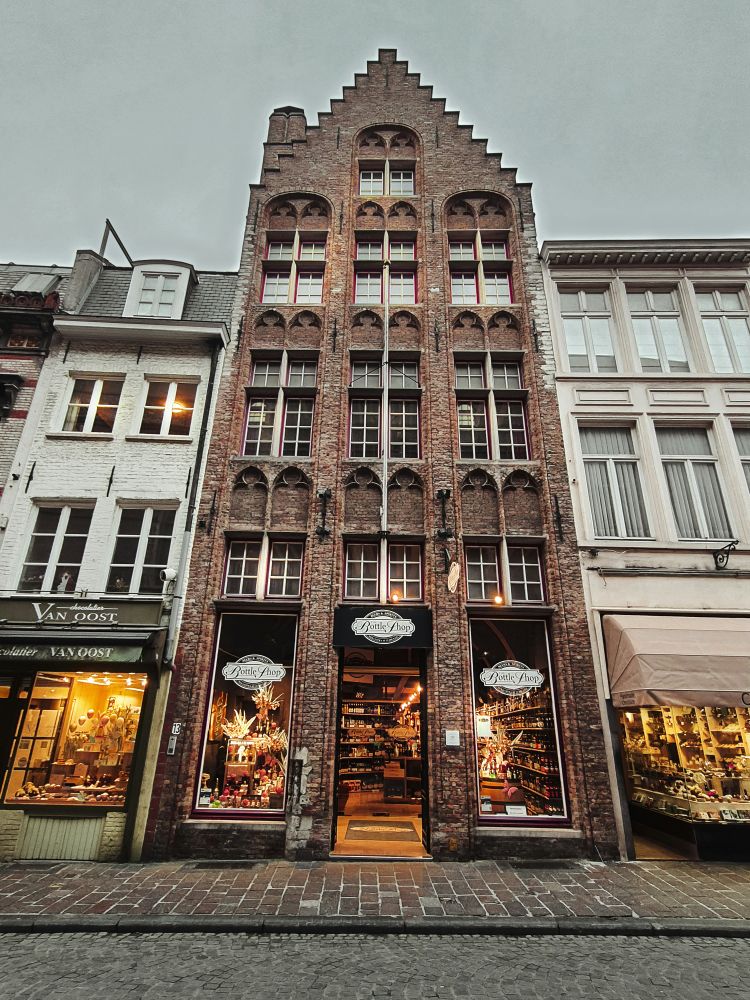 a tall building with a clock on the front of it