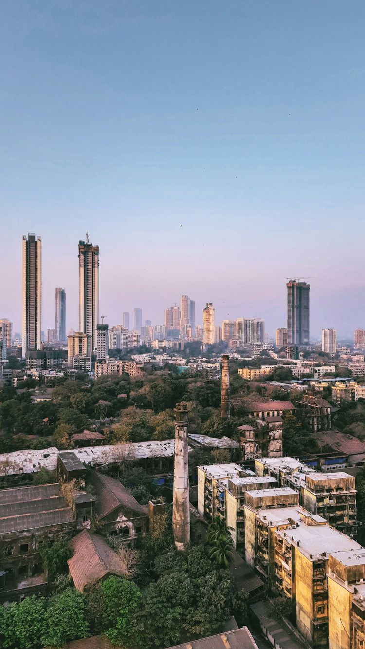 city skyline under blue sky during daytime