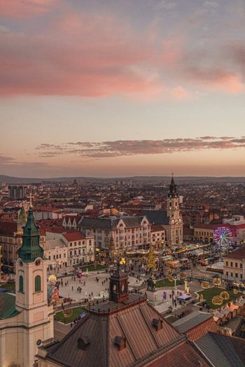 a view of a city with a ferris wheel in the distance