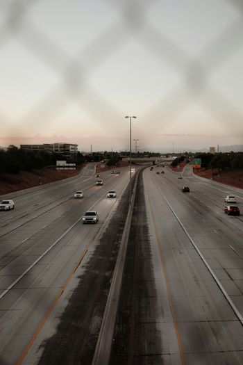 a highway with cars on it