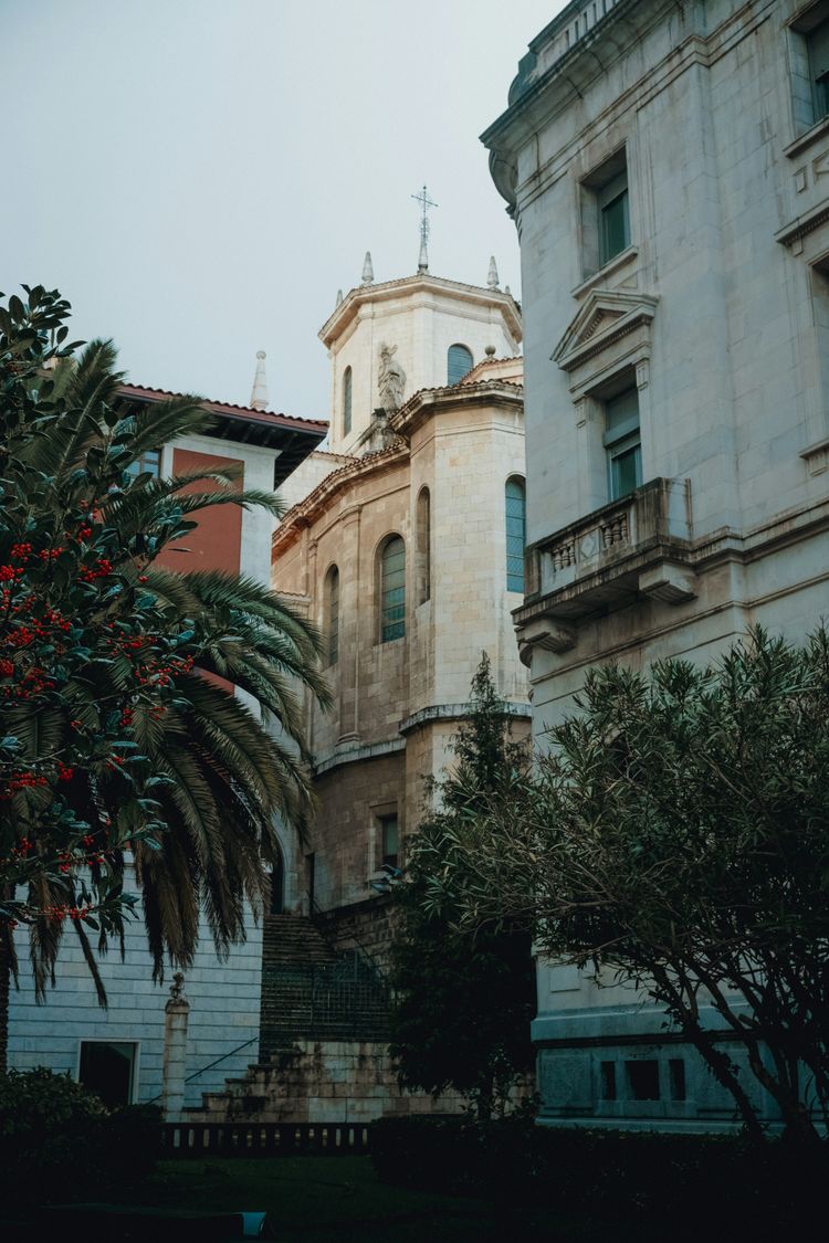 a tall building with a clock on the top of it