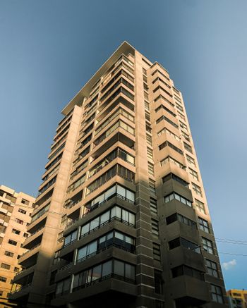 a tall building with balconies