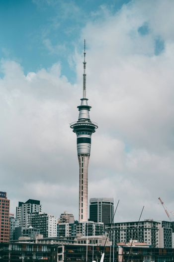 gray concrete tower under white clouds during daytime