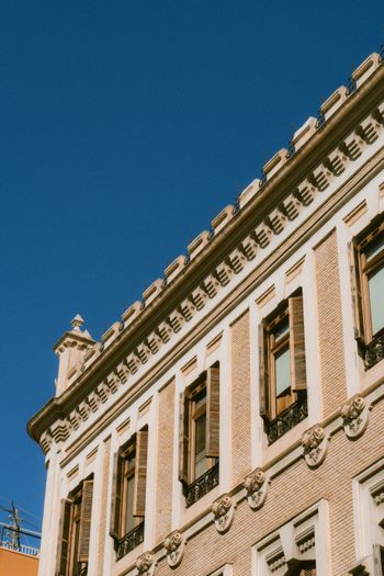 a clock on the side of a building