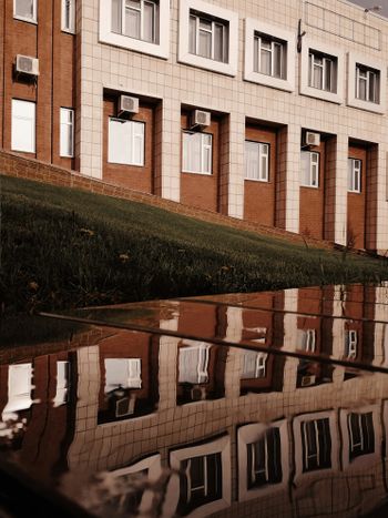 brown and white concrete building close-up photography