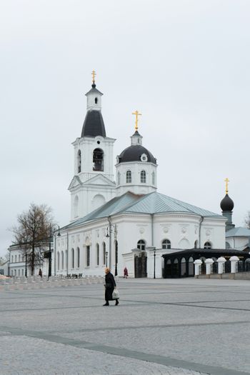 A large white building with a clock tower