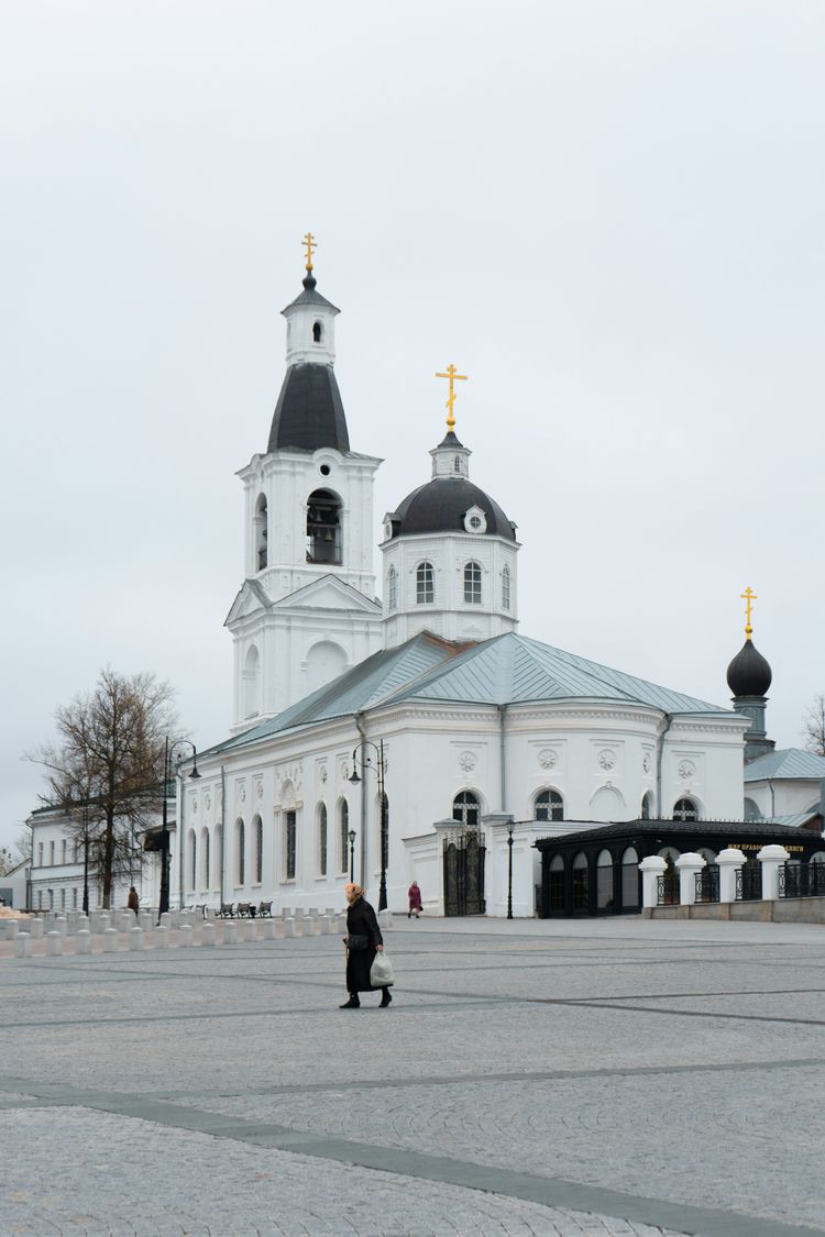 A large white building with a clock tower