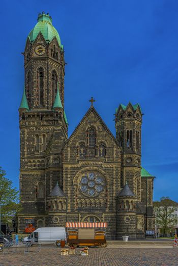 a large building with a clock on the front of it