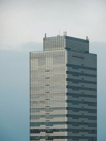 gray concrete building under gray sky