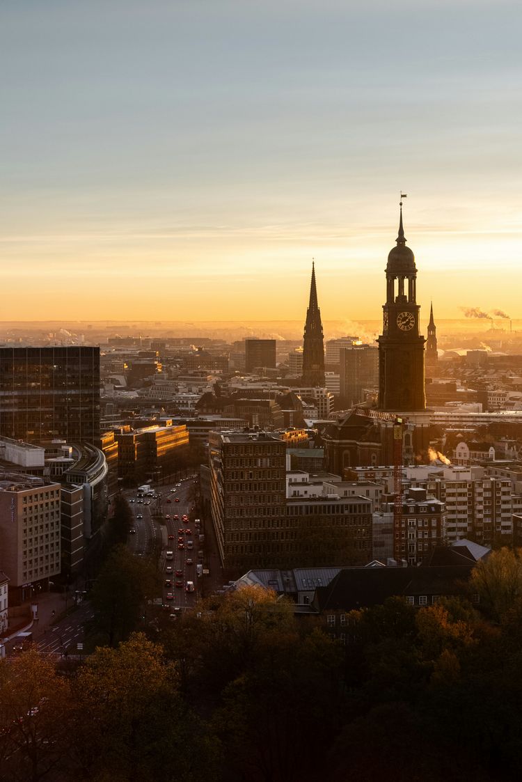 a view of a city with a clock tower