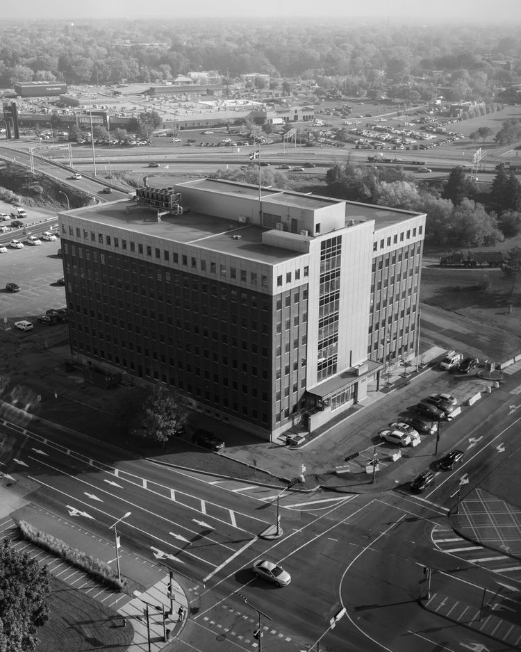 a black and white photo of a large building