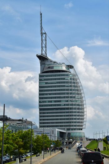 architectural photo of a white and green building