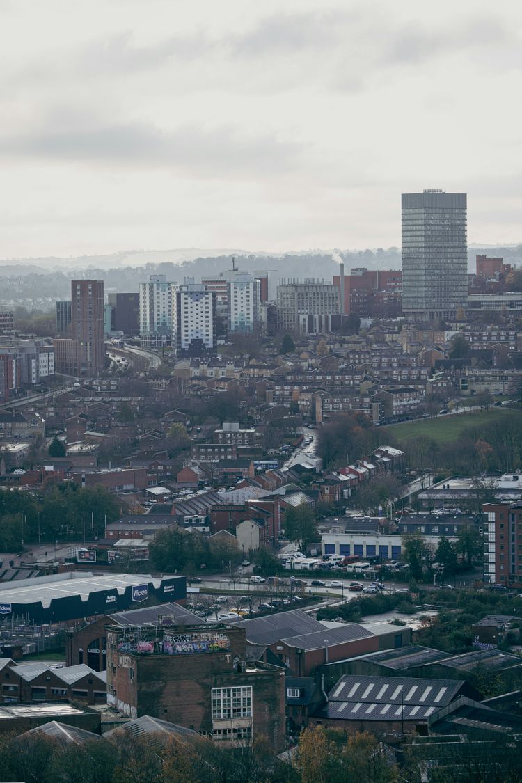 a view of a city with tall buildings