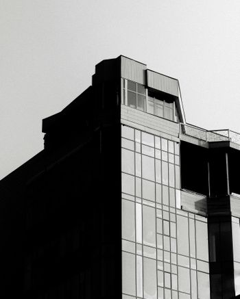 a black and white photo of a tall building