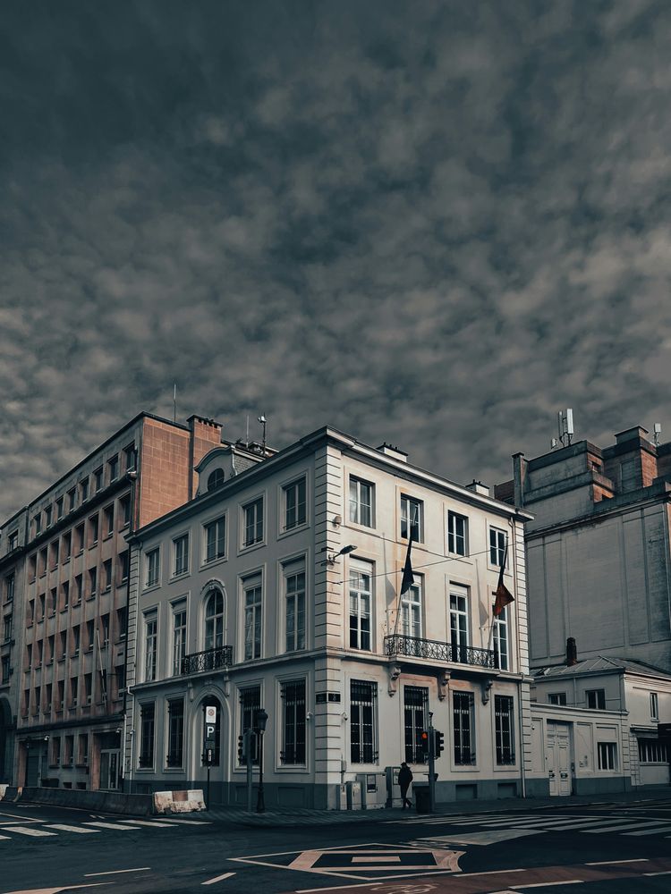 A row of buildings sitting next to each other on a street