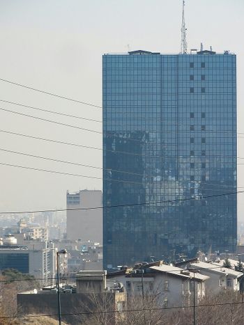 a city with a very tall building in the background