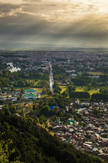 a view of a city from the top of a hill