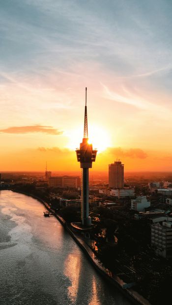 city skyline during sunset with tower