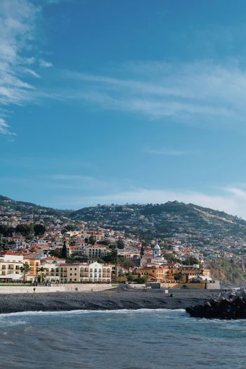 a view of a city from the ocean