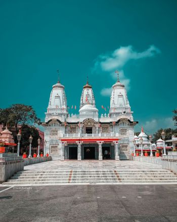 a large white building with towers