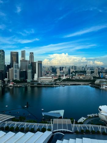 A large body of water surrounded by tall buildings