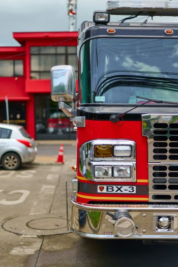 A fire truck parked in front of a building