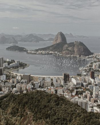 city buildings near body of water during daytime