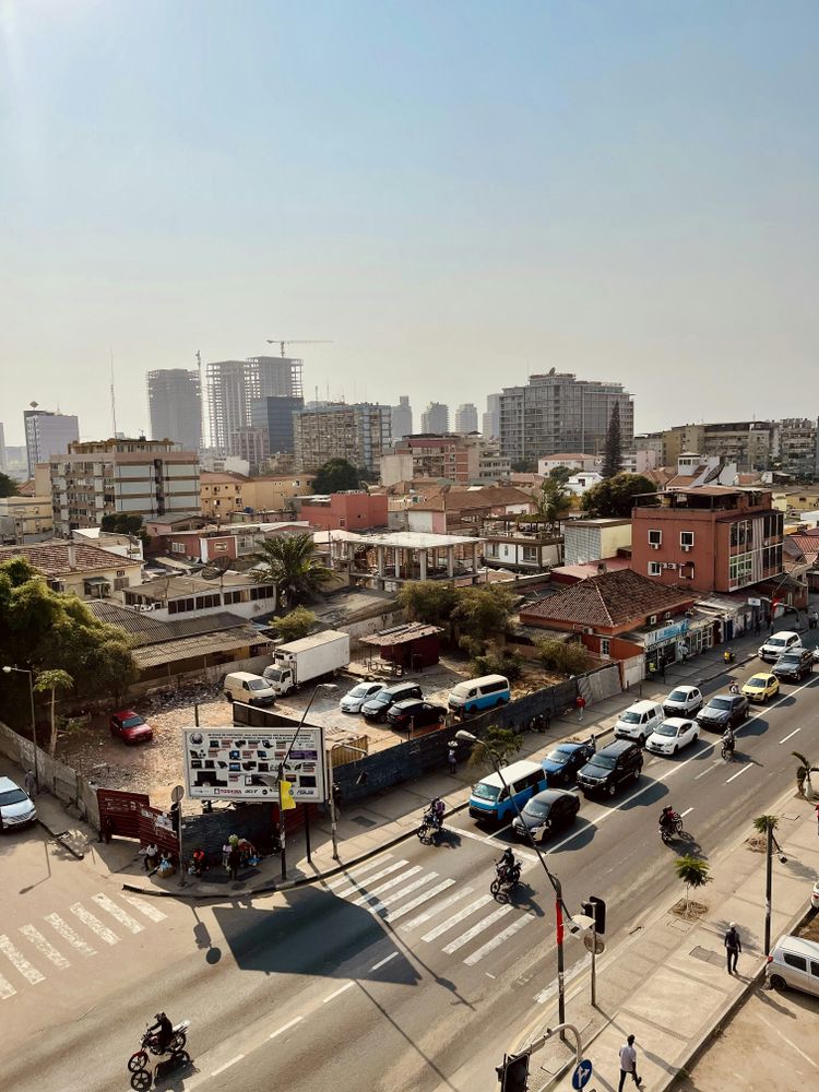 cars parked on street near buildings during daytime