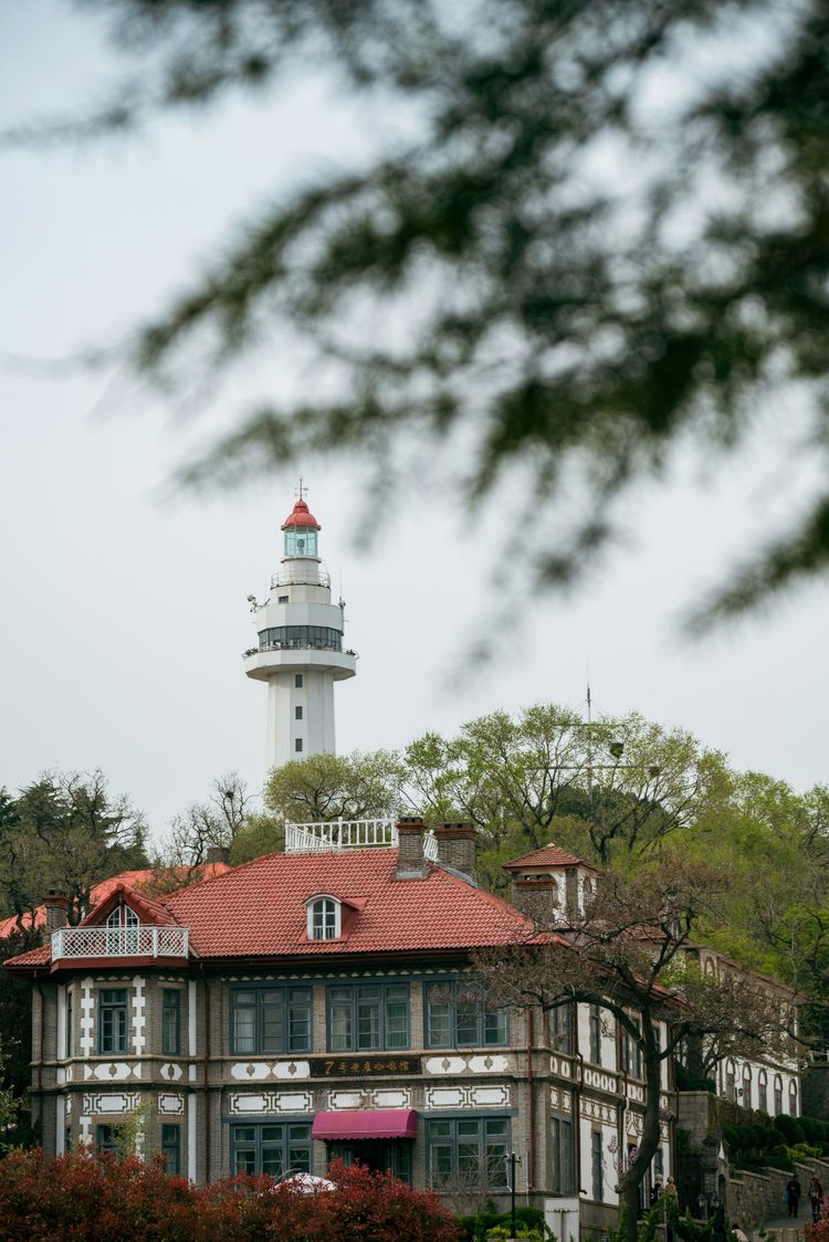 a building with a light house on top of it