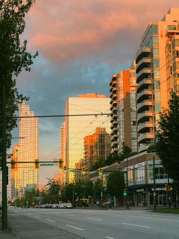 a city street with tall buildings