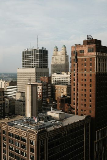 brown and white concrete building during daytime