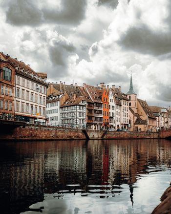 a body of water with buildings along it