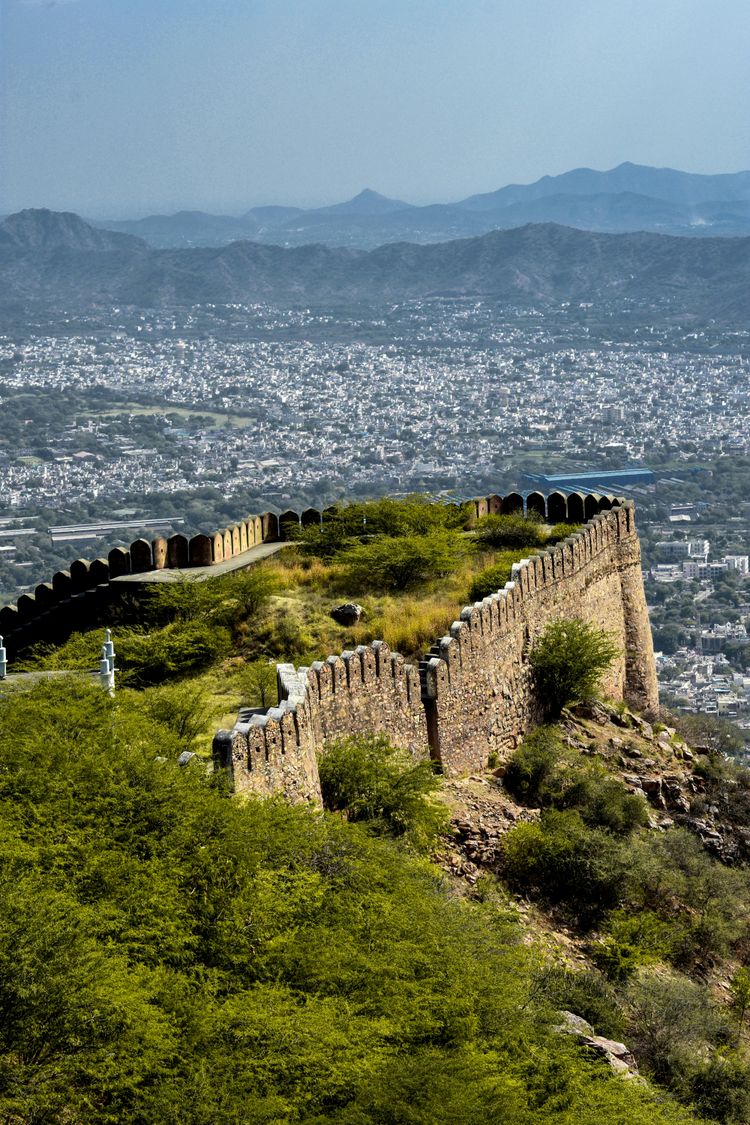 a view of a city from a hill