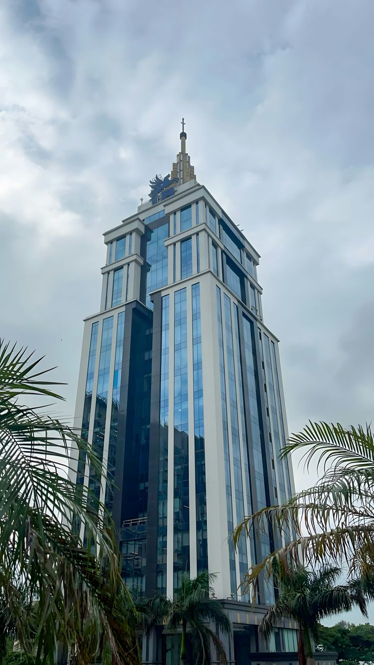 A very tall building with a sky background