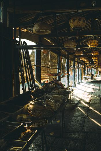 a long table with baskets of food on it