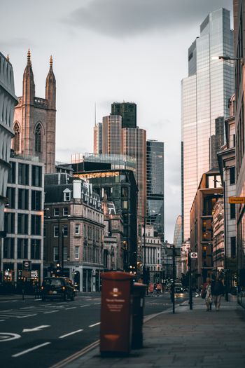 a city street with tall buildings