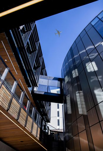 low angle photography of clear glass building