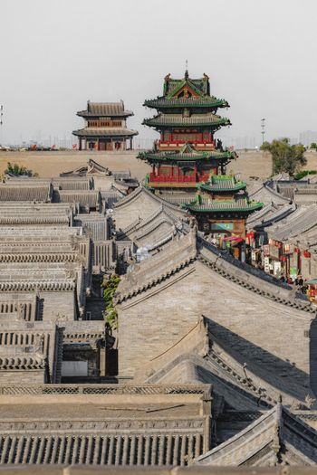 a large building with a tower in the middle of it