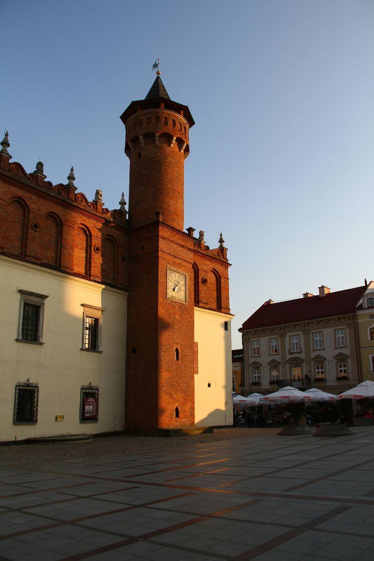 A large brick building with a clock tower